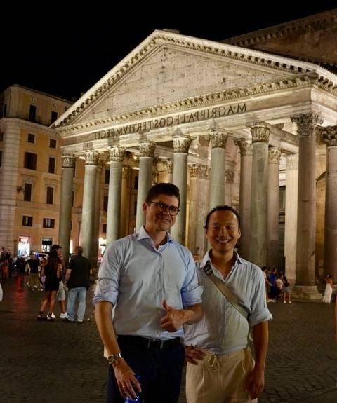 Professors Wenhui Xie and Andrew Spear in front of Pantheon in Rome, Italy at night.